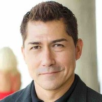 Alex Torres, Director and Founder of Crossroads Scholarship Fund, commending Allison Gaddy and Moxie Signature Group’s impeccable work ethic and concierge-level real estate service.